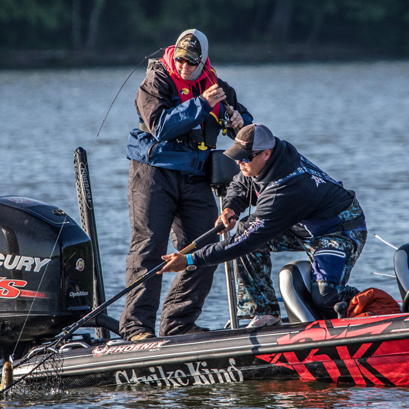 Troy and friend netting a fish-2